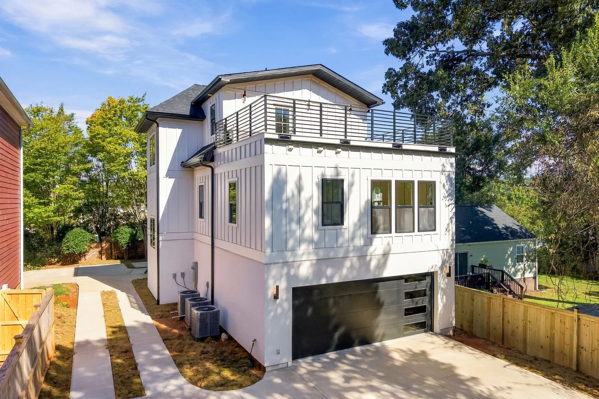 Rear elevation with garage and rooftop terrace