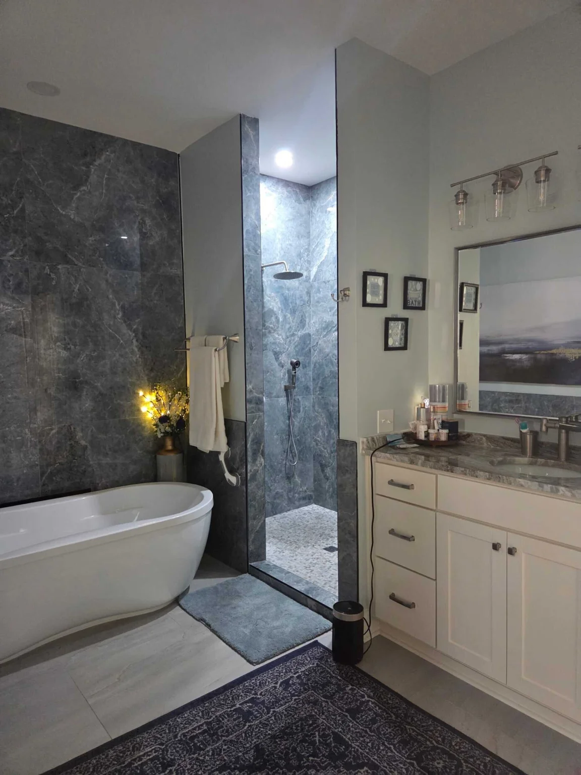 Freestanding tub, shower, and vanity at the Marietta residence