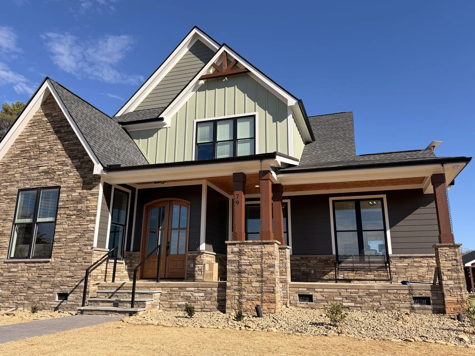 Timber porch and stone columns at the Marietta residence