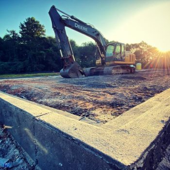 excavator on construction site greenville sc